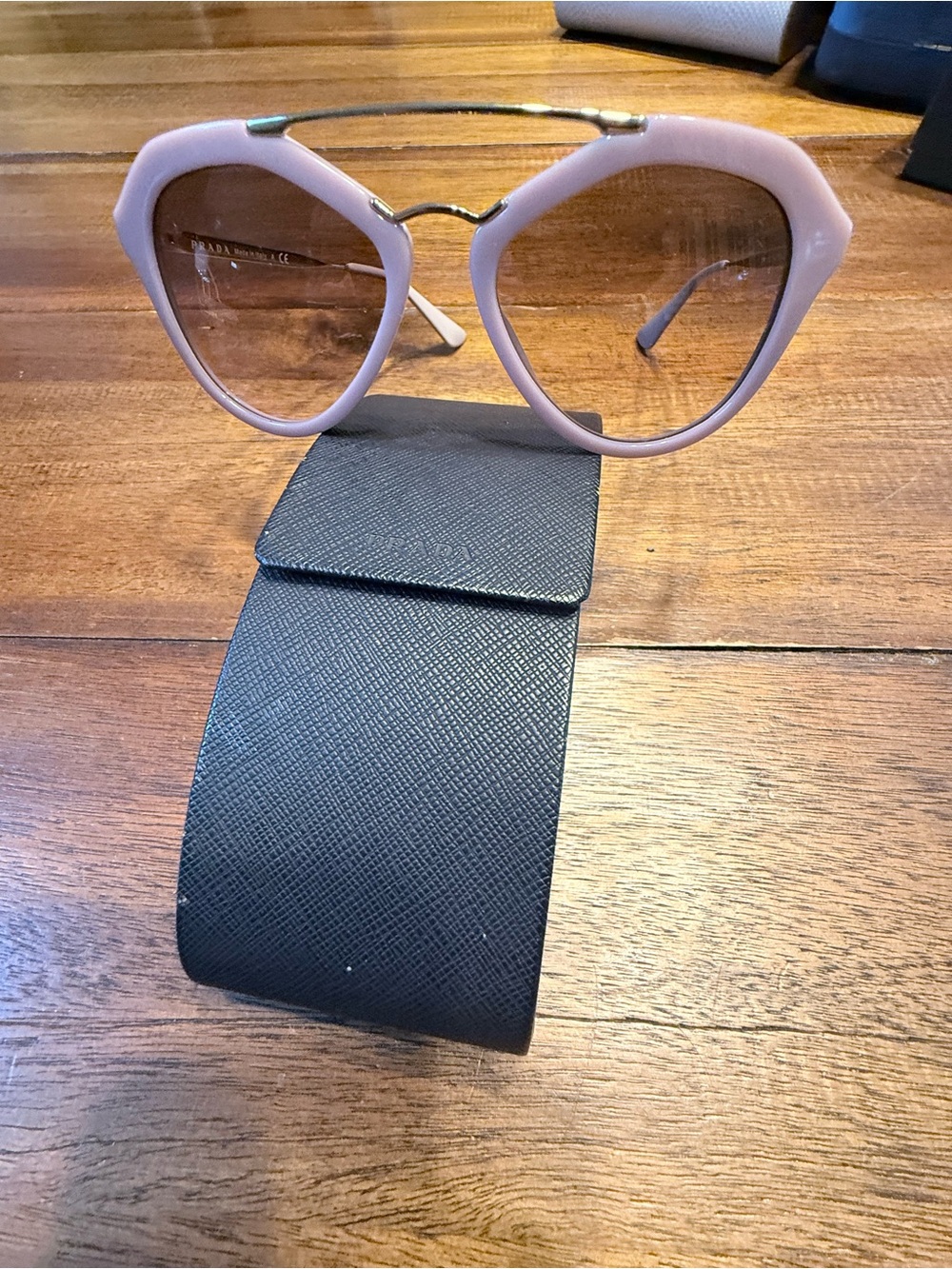 Prada Pink Cat-Eye Sunglasses with Gold Brow Bar
